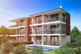 Njivice - dvoetažni apartman u blizini plaže, Omisalj